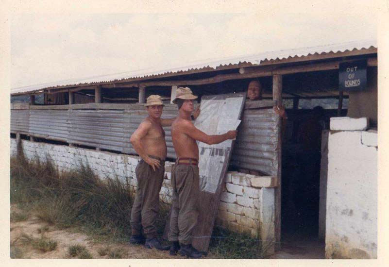 Frank Dunphy and John Downs at Takama with Lt. Adrian Hughes (from Royal Warwickshire Fusiliers)