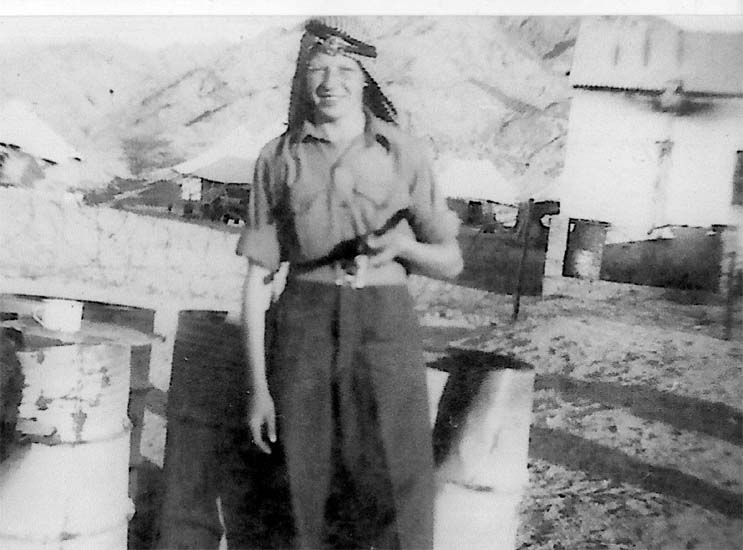 Arab headress is Harry Gudgeon Aqaba 1951,with the back of the cookhouse