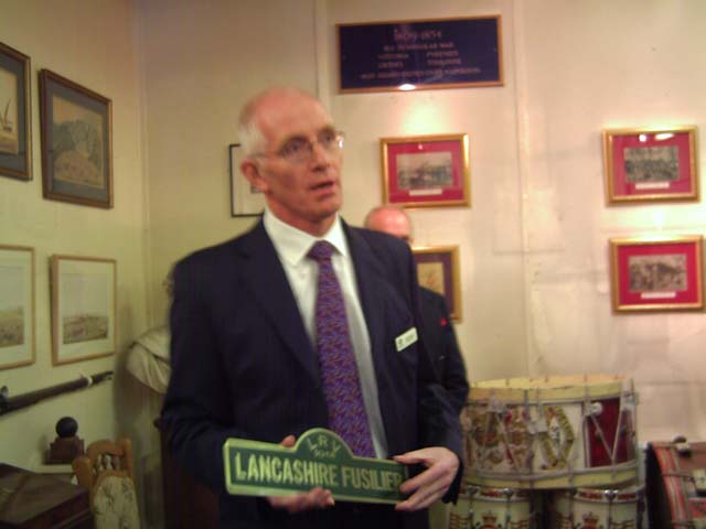 David Godley with the Name plate for the museum