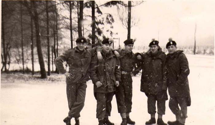 Fusiliers in the snow outside the Dewdrop Inn in Winterberg when we ( D Coy ) ran the Winter Warfare Training centre for 3 months ,I think this was Jan, Feb, Mar.62 - from left ,1. Unknown Fus, 2. Cpl Paddy Fitzgerand (Reg Police) Fus Jimmy Stockton from Worsley,Fus Eddie Bates and Fus Harry Wright.
