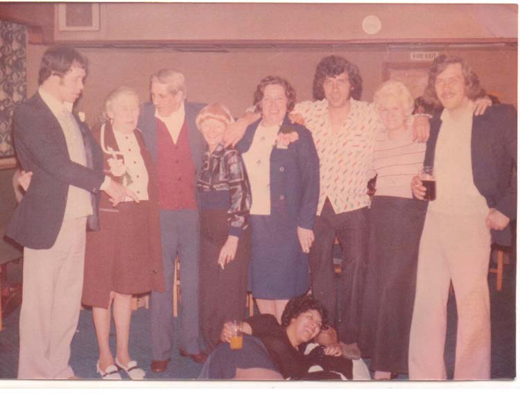 Brother Tony, Mother, Father, sister Marjorie, sister Beryl, brother Fred, sister Brenda, brother John. Girl at bottom of pic is Brian's Neice,Bubbles.
