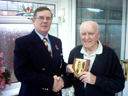Geoff Pycroft handing Bill Dalton the Plaque from the LF Web Site to place on the graves of Burma veterans