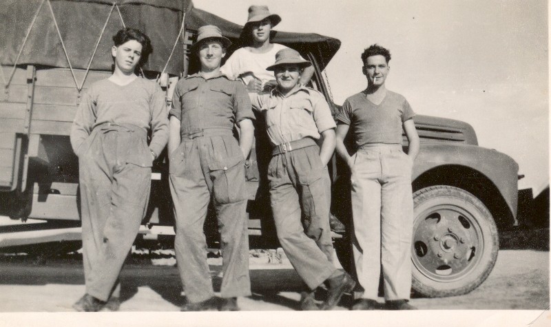 Five man 'unit' with Chevvy truck (that truck was held in great affection). Jack Bibby standing,
second from right. All men on This Photo except Bill Fryer (maybe he took the picture…)
also appear on No. 13, so maybe this is Kurcaile too.