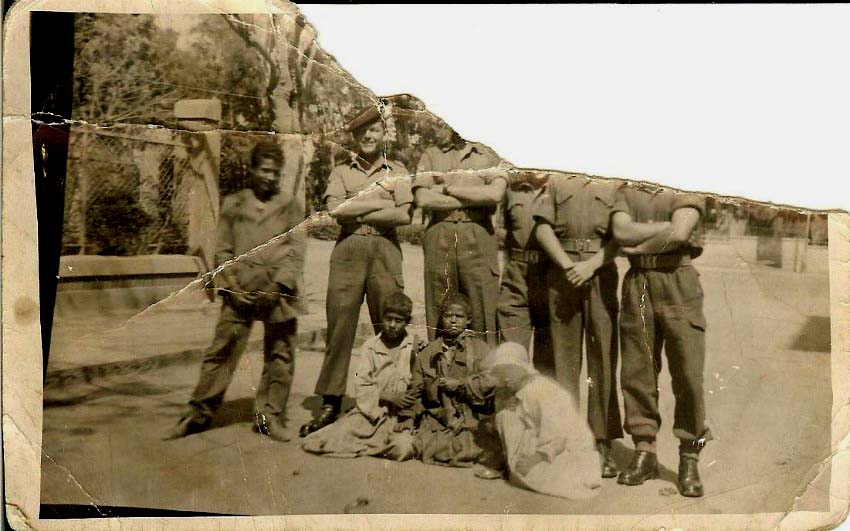 Monty,s Ismailia.I am the one with head, one of the faceless ones is Lofty Watson. This was post police station episode note we had gathered some friends. Buckshees was there motive.Some of the lads will remember Monty,s.